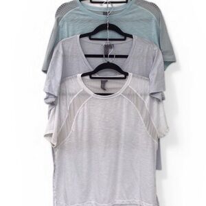 Two Sweaty Betty Short Sleeve Tops - Blue and Blue Gray.